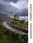 Eilean Donan a small tidal island with castle, connected by footbridge to the mainland in the Western Highlands of Scotland