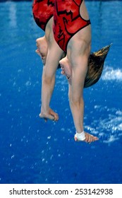 EINDHOVEN, HOLLAND-MARCH 18, 2008: Female Synchronized Divers Diving Into Pool At The European Swimming Championship, In Eindhoven.