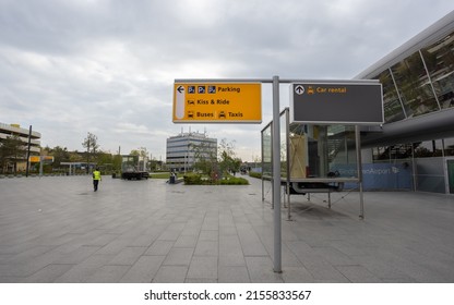 Eindhoven, Netherlands 5 May 2022 : Parking, kiss and ride and car rental signage on a post at Eindhoven International airport 