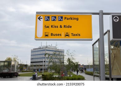 Eindhoven, Netherlands 5 May 2022 : Parking, kiss and ride and taxi signage on a post at Eindhoven International airport 