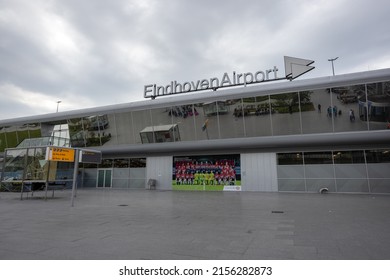 Eindhoven, Netherlands 5 May 2022 : Eindhoven airport sign outside terminal building with photo of PSC Eindhoven football soccer team 