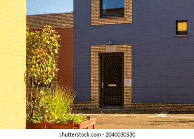 Eindhoven, The Netherlands, August 14th 2021. Colorful Blue And Yellow Mediterranean Style Houses In Woensel On A Sunny Day 