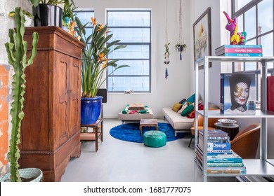 Eindhoven, the Netherlands, February 2nd 2020. An industrial city loft interior. A spacious, bohemian, modern, mix and match eclectic styled living with colorful details. Home deco inspiration