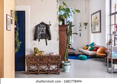 Eindhoven, the Netherlands, February 2nd 2020. An industrial city loft interior. A bohemian, modern, mix and match eclectic styled living with colorful details. Home decoration inspiration