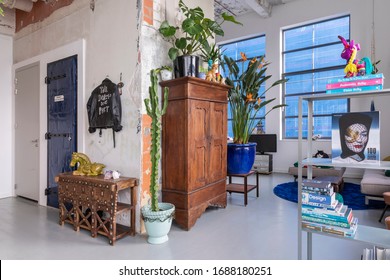 Eindhoven, the Netherlands, February 2nd 2020. An industrial city loft interior. A spacious, bohemian, modern, mix and match eclectic styled living with colorful details and plants. Home inspiration