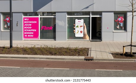 Eindhoven, The Netherlands - March, 3 2022: Flink, Depot Grocery Delivery Service. Delivered Within Ten Minutes. Bike, Part Of A Serie.