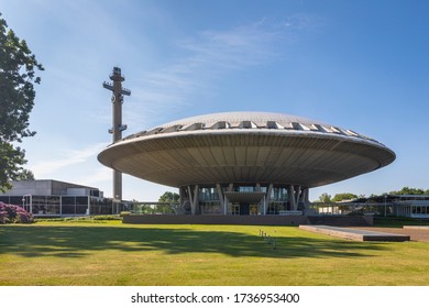 Eindhoven, The Netherlands, May 16th 2020. The evoluon, a futuristic UFO shaped building and landmark in Eindhoven city designed by Louis Kalff. Shot on a sunny day during spring