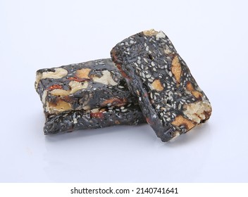 Ejiao Gao Walnut And Sesame Donkey Hide Gelatin Cubes Close-up For Use In Chinese Traditional Medicine