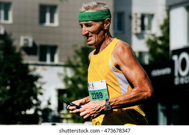 Ekaterinburg, Russia - August 7, 2016: Closeup Of Old Man Runner Watch On His Arm During Marathon Europe-Asia