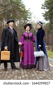 Ekaterinburg Russia - November 30, 2018 Public Historical performance for passengers and guests of Ural railway Mother son and daughter are waiting for train on station dressed in vintage costumes