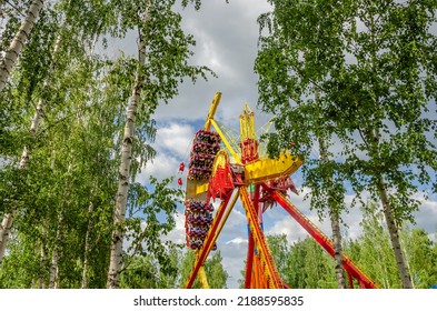 Ekaterinburg.Russia.June 21, 2022.People On Rides In An Amusement Park.