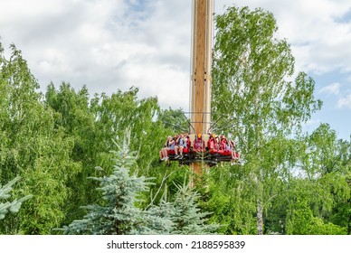 Ekaterinburg.Russia.June 21, 2022.People On Rides In An Amusement Park.