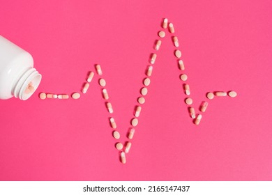 An EKG Pattern Made By A Lot Of Pink Pills