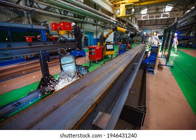 Ekibastuz, Pavlodar Region, Kazakhstan-May 28, 2012: Car-building Plant. Welding Steel Rail Part. Smoke Suction Machine (fume Extractor) In Focus.