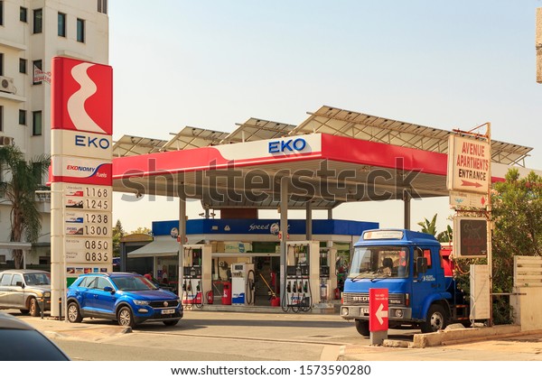 Eko petrol refueling. EKO gas\
station View of a EKO fuel and gas station in the center of town,\
many details, blue sky. Larnaca Cyprus November\
2019