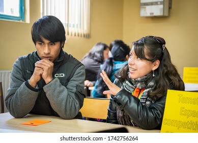 El Alto, La Paz / Bolivia - July 30 2014: Young Female And Male Indigenous Students Share Ideas During A Workshop