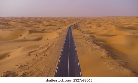 EL bnoud city To Timimoun city ; 340 km of Road surrounded by Beautiful Sand Dunes creating an amazing Sahara scape from the Algerian South west - Shutterstock ID 2327688065