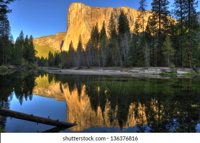 El Capitan mountain seen at sunset across the Yosemite river, Yosemite national park, California, USA - Powered by Shutterstock