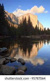 El Capitan At Sunset, Reflected In The Merced River, Yosemite National Park.