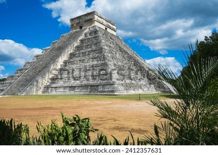 El Castillo Temple Chichen Itza with agave plants, Mexico