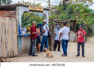 EL COBRE,  CUBA - FEB 1, 2016: Stall Selling A Street Food Pizza In El Cobre