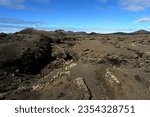 The El Cuervo Caldera, A  Impressive Vulcan Landscape , The Vulcan Island Lanzarote, A Trail in Vulcan Area, Cold Cava Fields, Volcanic landscape in the Canary Islands