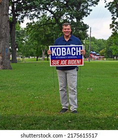 EL DORADO, KANSAS, USA - JUNE 15
Former Kansas Secretary Of State Kris Kobach Current Attorney General Candidate Poses With His New Campaign Lawn Sign At The Butler County Picnic