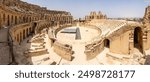 El Jem Colosseum in Tunisia, impressive ruins of massive Roman amphitheater built in 3rd century AD. Well-preserved structure showcases ancient Roman architecture, once hosted gladiatorial contests.