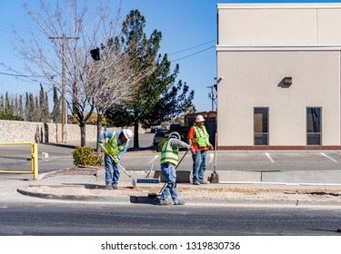 El Paso, Texas - 21 February 2019: Road Working Crew Hard At Work Repairing One Of El Paso's Busiest Streets.