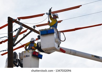 El Paso, Texas - 22 March 2019: Unidentified Men Working To Install New Electric Power Lines.