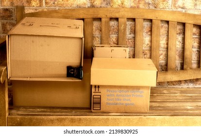 El Paso Texas - Circa March 2022:   
Delivered Packages Sitting On The Front Porch Bench Serving As An Invitation To Package Pirates Or Thieves.
   