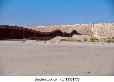 El Paso, Texas, USA- 1 June 2019
US-Mexico Border Wall Dividing Not Only Two Nations But The People Within Those Nations. 
Border Wall Running Through The Desert.