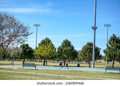 El Paso, Texas / USA - 14 April 2019: Boys Shooting Hoops In A City Park