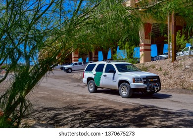 El Paso, Texas / USA - 15 April 2019: Border Patrol Vehicle Patrolling Along The Fence Between Mexico And The U.S.