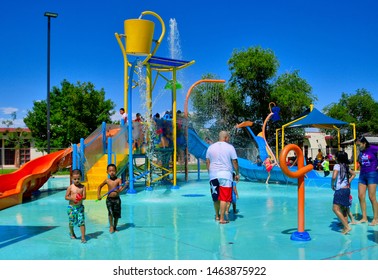 El Paso, Texas / USA - Circa July 2019
Children and adults enjoying a splash park in the summer heat. - Shutterstock ID 1463875922