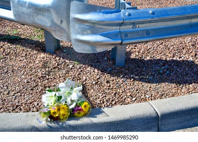 El Paso, Texas / USA - Circa August 2019
Flowers Left By An Unknown Person For The Victims Of The Walmart Shooting On 3 August 2019.