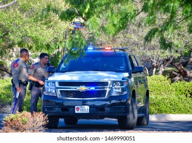 El Paso, Texas / USA - Circa August 2019
Police And Highway Patrol Blocking All Entrances To Walmart, Scene Of The 3 August Mass Shooting In El Paso, Texas.