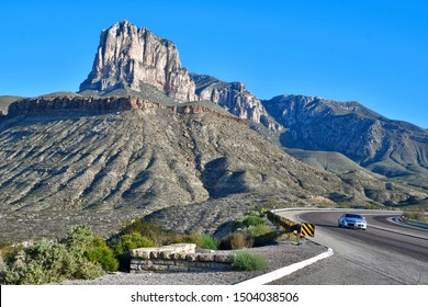 El Paso, Texas : USA Circa September 2019
El Capitan, The 10th-highest Peak In Texas.

Car Coming Out Of A Curve On A Mountain Road.

