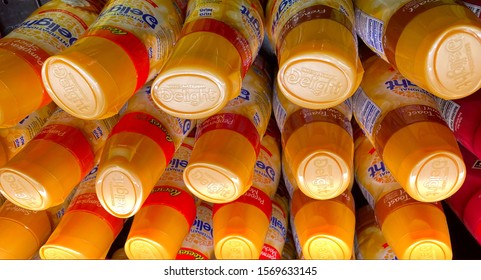 El Paso, Texas / USA: Circa November 2019
Orange Bottle Tops Of Dairy Creamer Bottle Displayed In A Grocery Store.
