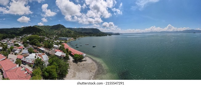 El Salvador City Landscape With Houses And Lake