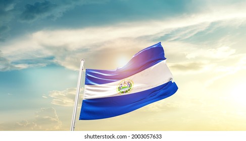 El Salvador National Flag Waving In Beautiful Clouds.