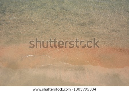 Similar – Luftpanorama-Drohne Blick auf die Meereswellen, die am felsigen Strand erdrücken.