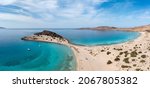 Elafonisos island, Simos Frangos double beach Peloponnese. Greece. Famous sandy beach, aerial drone view. Turquoise clear water and white sand. Summer vacation destination