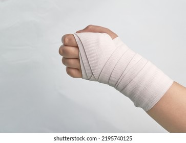 elastic bandage roll support hand wrist and finger isolated on white - Shutterstock ID 2195740125
