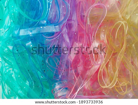 Elastic Polymer bands in colorful colors, macro background. Shallow depth of field.