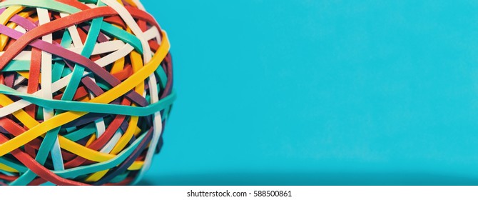 Elastic Rubber Band Ball On A Blue Background