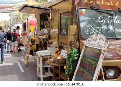 Elche, Alicante, Spain; On May 27, 2018; Ornaments And Food For Sale In A Street Food Truck 