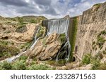 Elche swamp. Spectacular waterfall in the Elche reservoir. In Elche, Alicante, Valencian community, Spain