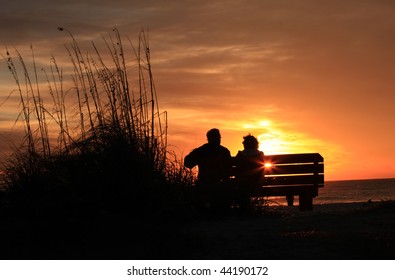 Elder Couple Watching Sunset