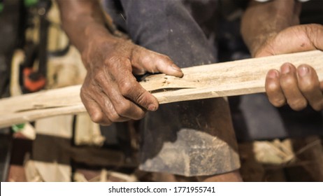 Elder Man Hand Use Knife Cutting And Shape Bamboo Craftman Work In Thailand